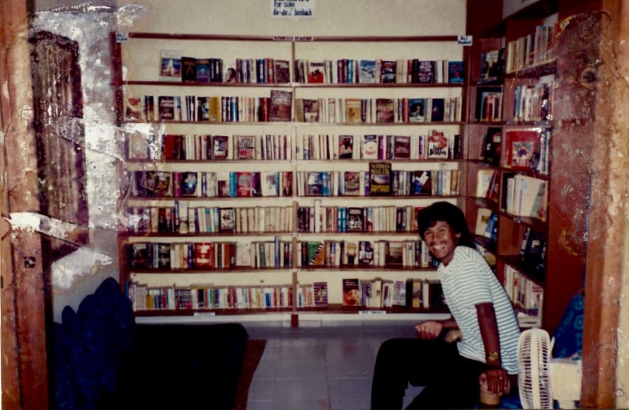 Made Sumendra with the library book collection